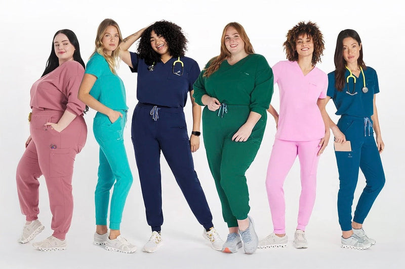 Healthcare professionals wearing scrubs of various colors to illustrate how scrub color influences patient trust and staff morale