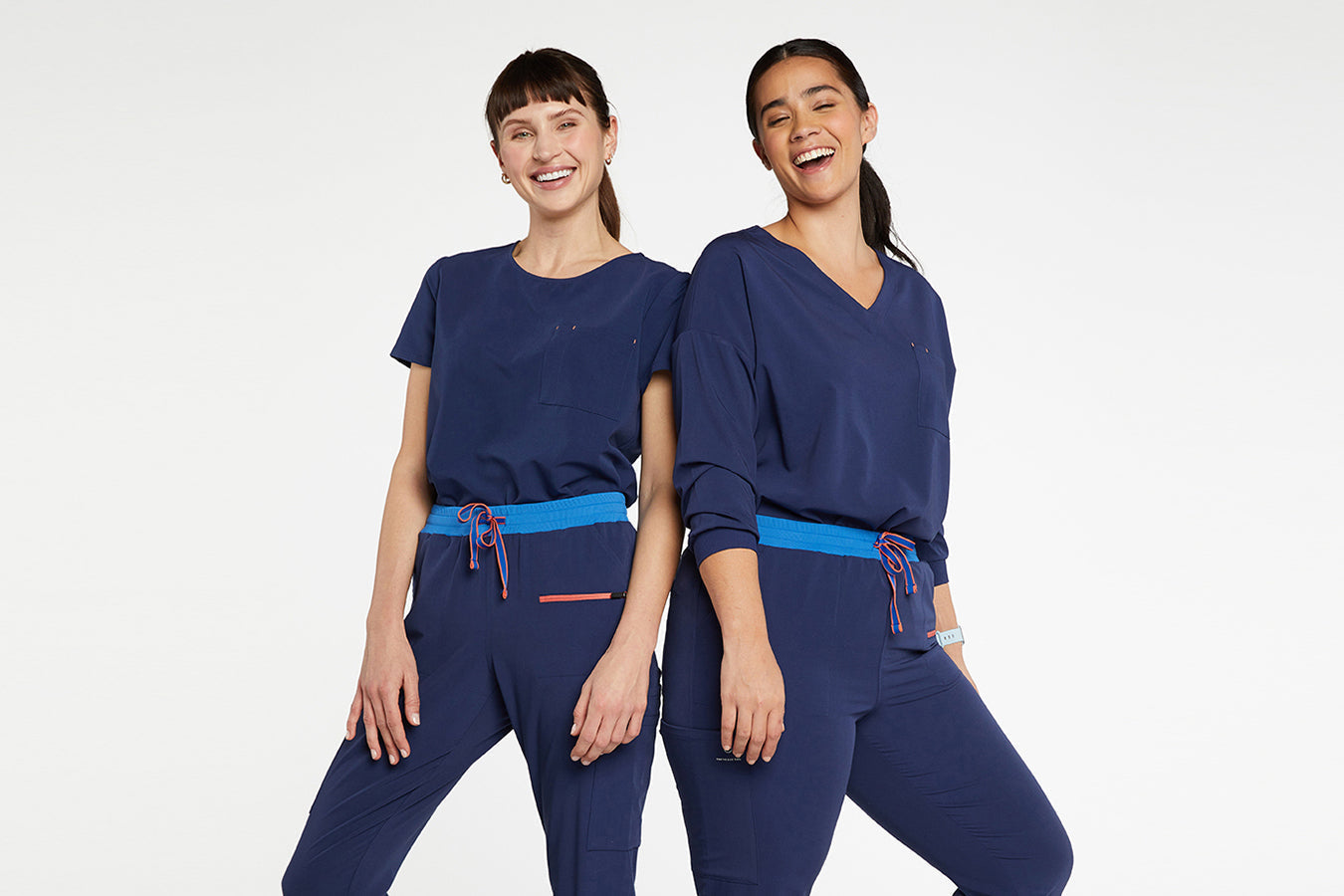 Healthcare professionals mixing and matching women’s scrub tops and pants to create stylish, functional uniform combinations