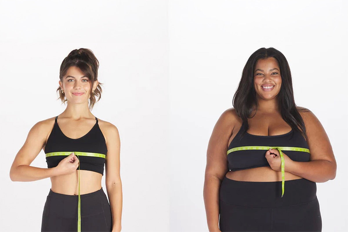 Body measurements being taken to ensure best fit for plus-size nurse scrubs