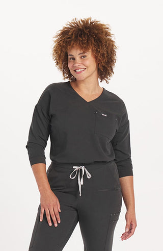 Woman in Alpine Dolman 2-Pocket CORE Scrub Top Charcoal- DOLAN