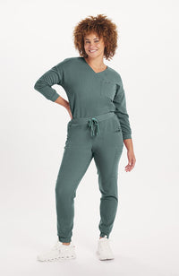 Woman wearing Alpine Top in Deep Sage 