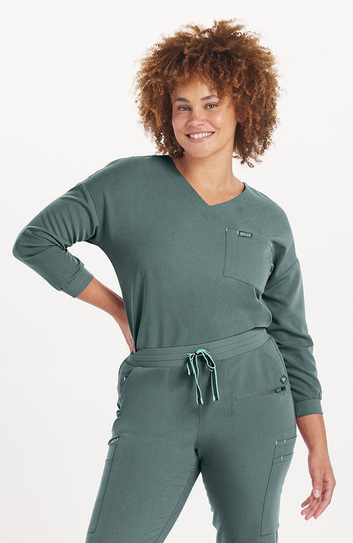 Woman wearing Alpine Top in Deep Sage 