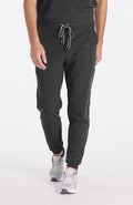 A man wearing Andre 8-Pocket Men's CORE Scrub Jogger Pant in Charcoal 