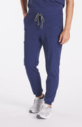 Man wearing Andre 8-Pocket Men's CORE Scrub Jogger Pant in Navy Blue - DOLAN