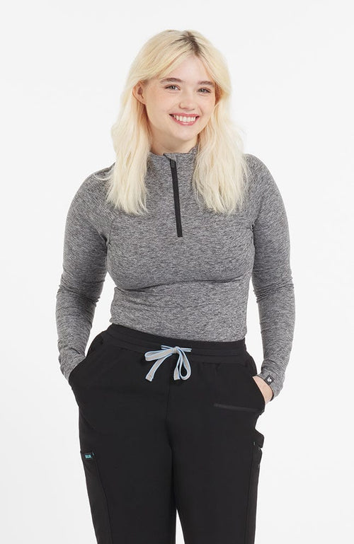 Woman wearing Bond Baseluxe Slim Fit Half Zip Top in Heather Grey