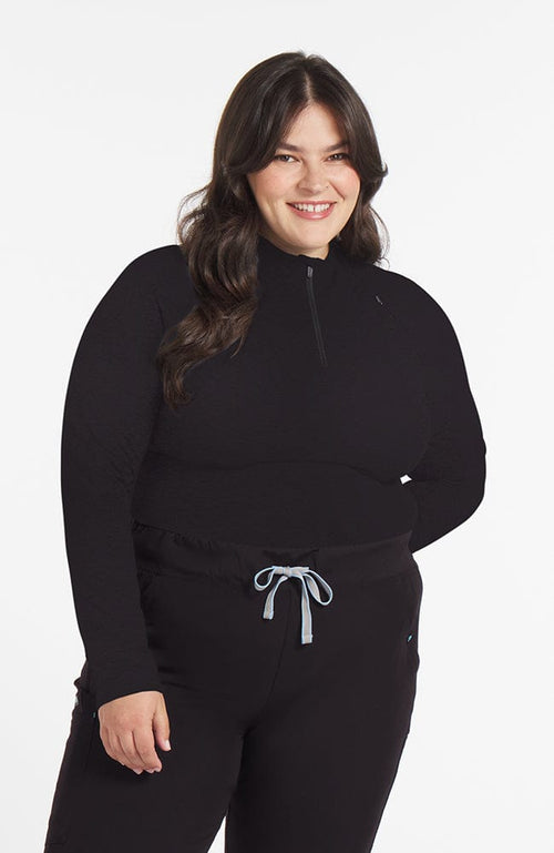Woman wearing Bond Baseluxe Slim Fit Half Zip Top in Black