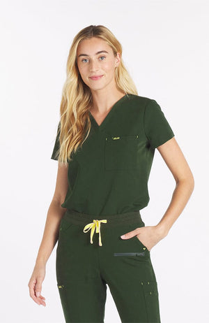 Woman wearing dark olive the Mayfair 2 pocket scrub top from DOLAN