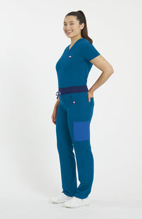 Woman wearing District Pant in Caribbean Blue Colorblock - DOLAN