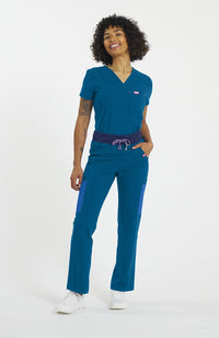 Woman wearing District Pant in Caribbean Blue Colorblock - DOLAN