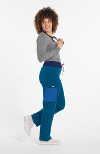 Woman wearing District Pant in Caribbean Blue Colorblock - DOLAN