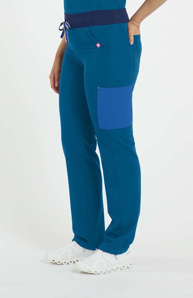 Woman wearing District Pant in Caribbean Blue Colorblock - DOLAN