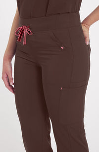 Woman wearing District Pant in Mocha Rose - DOLAN