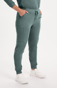 Woman wearing Hope Jogger in Deep Sage 