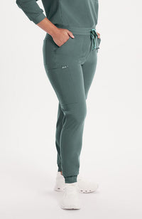 Woman wearing Hope Jogger in Deep Sage 