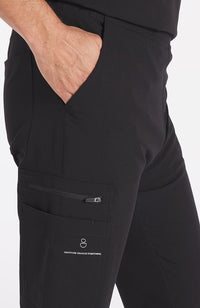 Man wearing black Orlando 9-Pocket Men's CORE Scrub Cargo Pant - DOLAN