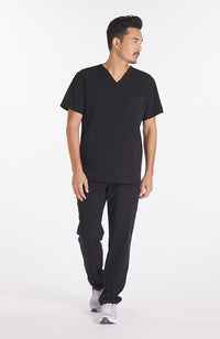 Man wearing black Orlando 9-Pocket Men's CORE Scrub Cargo Pant - DOLAN