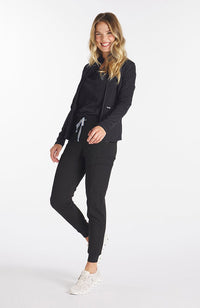 Park slim fit active jacket in black on a blonde haired woman