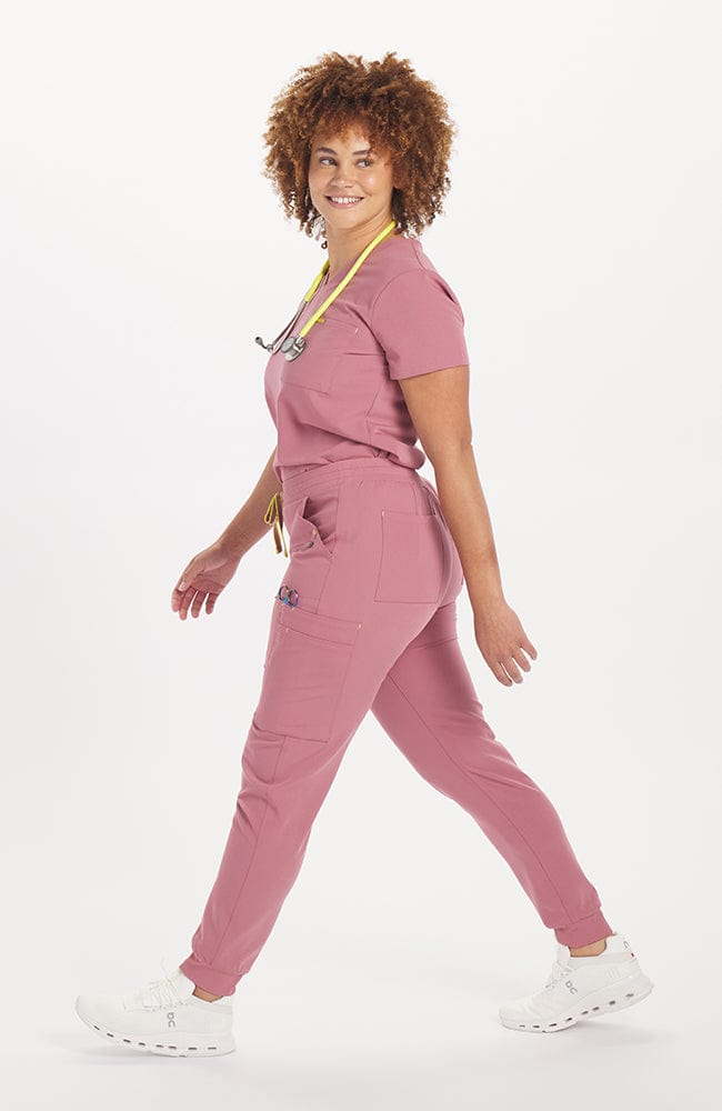 Hope 11 pocket jogger scrub pant in rosewood pink on woman