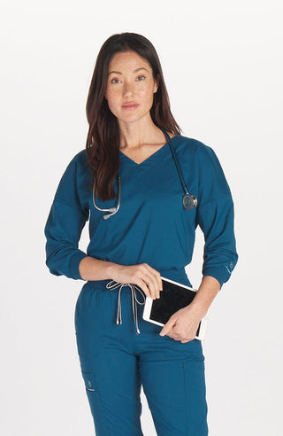 DOLAN Solaire three quarter sleeve scrub top in Caribbean Blue